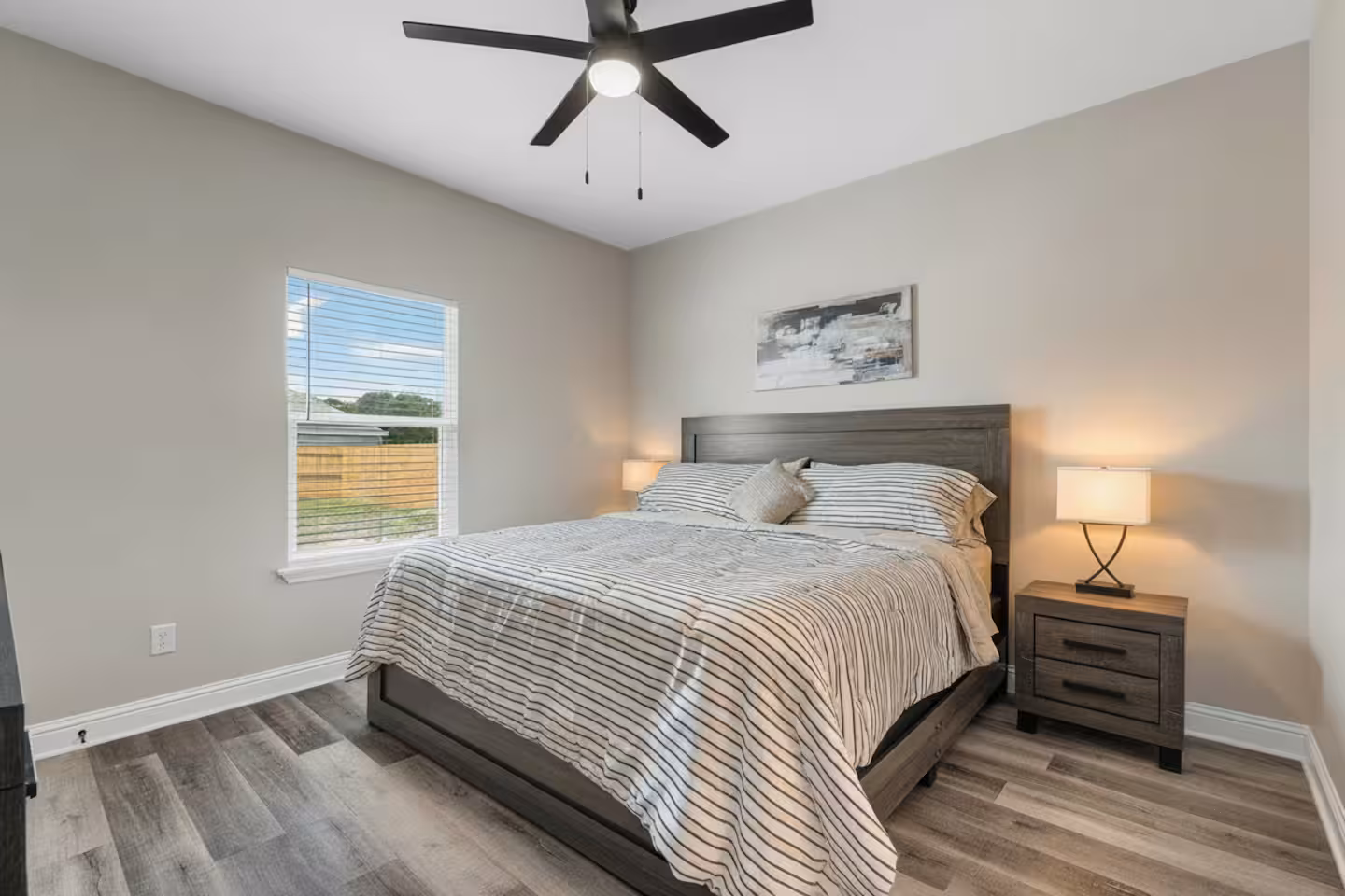 Sunlit bedroom with crisp linens